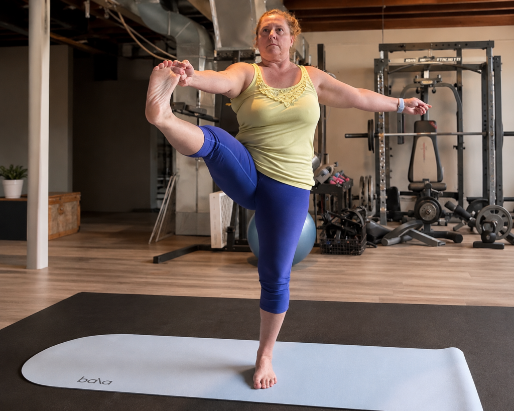 Shelley doing a yoga pose- strength and aging